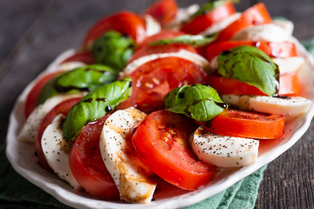 Caprese salad with tomatoes, mozzarella, and basil